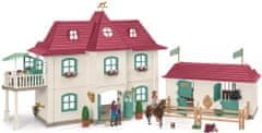 Schleich 42551 Nagy ház istállóval, kiegészítőkkel és mozgatható végtagú figurákkal