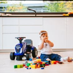 Falk Traktor Baby New Holland kék pótkocsival + tartozékok 1 éves kortól