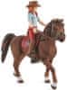 42539 Vörös hajú Hannah mozgó végtagokkal lovon